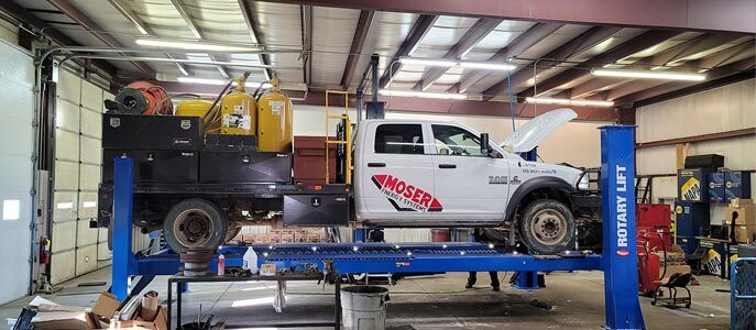 Commercial Truck suspended on a RotaryLift